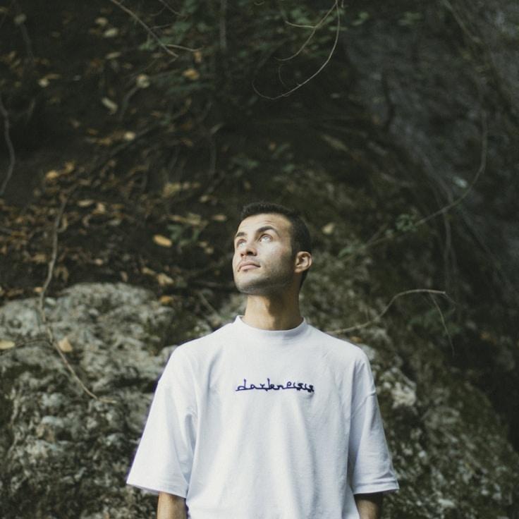 Avery Chen, Lead Design Curator at Holistic Growth Path, reviewing corporate floral arrangements